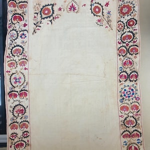 A 19th century tapestry Suzani from Bukhara central Asia. Probably first quarter of 19th century.
