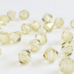 Jonquil Light Yellow Bicone Swarovski Crystals Article 5301  74 beads 5mm