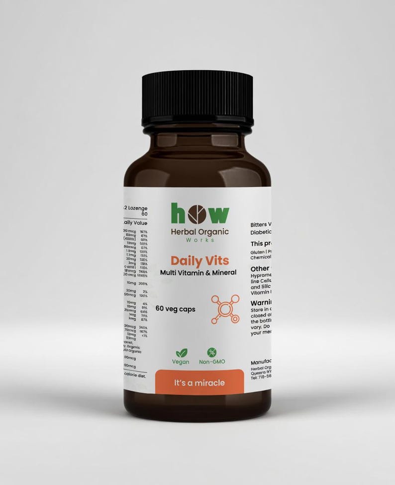 May include: A brown glass bottle with a black cap, labeled "Daily Vits Multi Vitamin & Mineral." The label includes the text "60 veg caps," and "It's a miracle." The bottle contains a supplement.