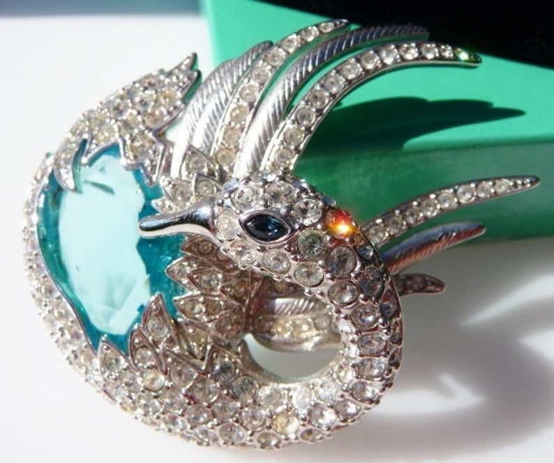 silver tone faux topaz aquamarine sea blue stone Nolan Miller swan brooch pin designer signed vintage