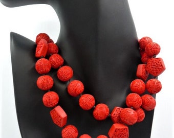 Joan Rivers Chinese red faux carved cinnabar resin bead necklace, hand knotted black silk, 30 to 33 inches, signed vintage