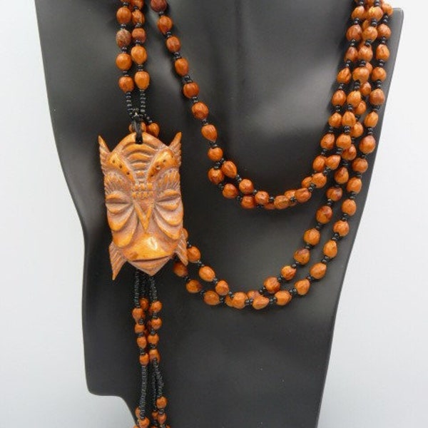 African carved portrait mask pendant necklace, bone glass seeds, brown black, unsigned vintage ethnographic art