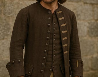 May include: A dark brown, long-sleeved coat with a button-up front and decorative buttons on the cuffs. The coat has a tailored fit and is worn over a matching vest. The outfit is reminiscent of historical attire.