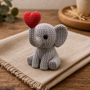 Gebreid olifantenfiguurtje met hartje, 3D-geprint olifantencadeau en woondecoratie.