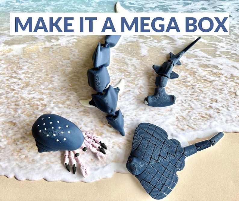 May include: Four articulated plastic sea creatures in blue and white. A hammerhead shark, a stingray, an octopus, and a whale shark.  The text "MAKE IT A MEGA BOX" is at the top of the image.