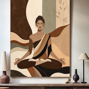 Peut inclure: Impression d'art abstrait d'une personne en posture de yoga assise. L'œuvre présente une palette de couleurs de bruns, de beiges et de noir. La figure est drapée d'un châle à motifs rayés. L'arrière-plan a un design en couches.