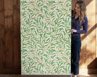 May include: A large rectangular wall hanging featuring a repeating pattern of green willow leaves and branches on a cream background. The artwork is framed in a light brown wooden frame, creating a natural and botanical aesthetic.