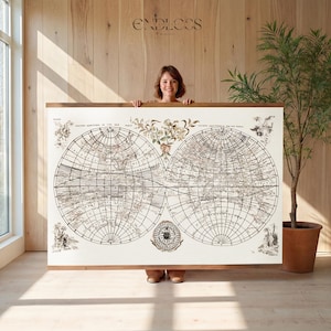 May include: A large rectangular wall hanging featuring a vintage-style double hemisphere world map printed on off-white canvas. The map displays black ink cartography with floral illustrations, a central compass rose, and wooden hanging rails.