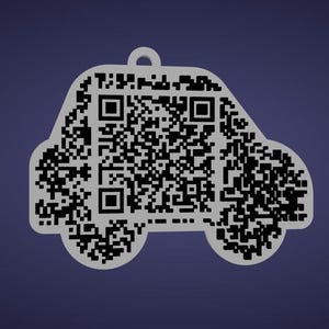 May include: A car-shaped pendant with a QR code design. The pendant is light gray and has a small loop at the top for hanging. The QR code is black and white, filling the car's outline. The background is a dark blue.