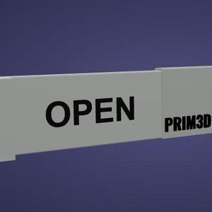 May include: A light gray rectangular object with the word "OPEN" in bold black letters. The text "PRIM3D & CREATE3D" is printed in black on the right side of the object. The background is a solid dark blue.