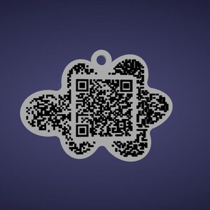 May include: A gray cloud-shaped tag with a QR code in the center and a small hole at the top. The QR code is black and white, and the tag is set against a dark blue background.