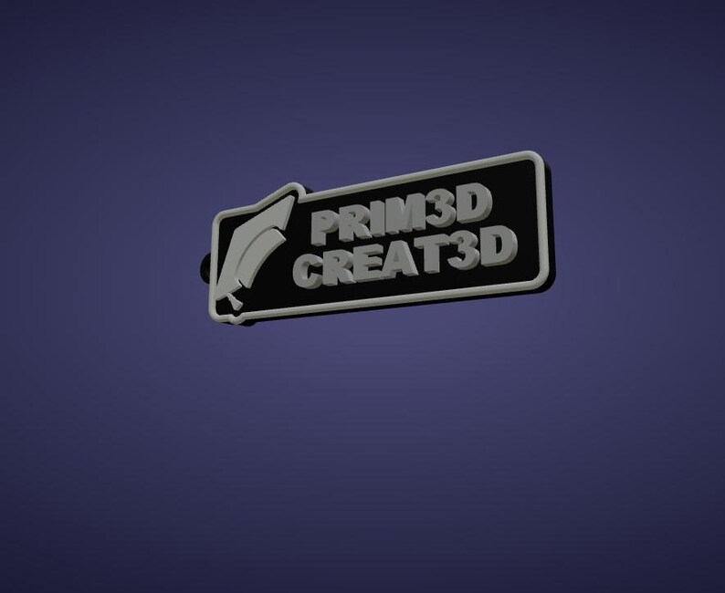 May include: A 3D-printed sign with the text "PRIM3D CREAT3D" in white, set against a black rectangular background with a white border. The sign features a graduation cap icon and is set against a dark blue background.