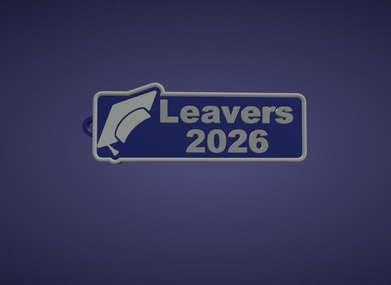 May include: A blue and white rectangular keychain with the text "Leavers 2026". The keychain features a graduation cap graphic in the upper left corner. The background is a solid dark blue.