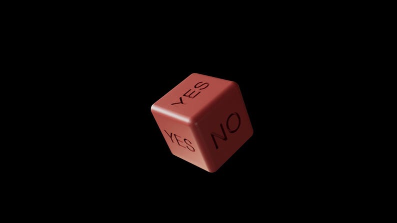 May include: A red decision die with the words "YES" and "NO" printed on its faces. The die is set against a black background, creating a sense of focus on the object.
