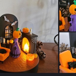 May include: A miniature Halloween scene featuring a black fireplace, an orange armchair with a black cat, and a pumpkin-headed figure in a purple dress. The scene includes bats, candles, and pumpkins, creating a spooky atmosphere.