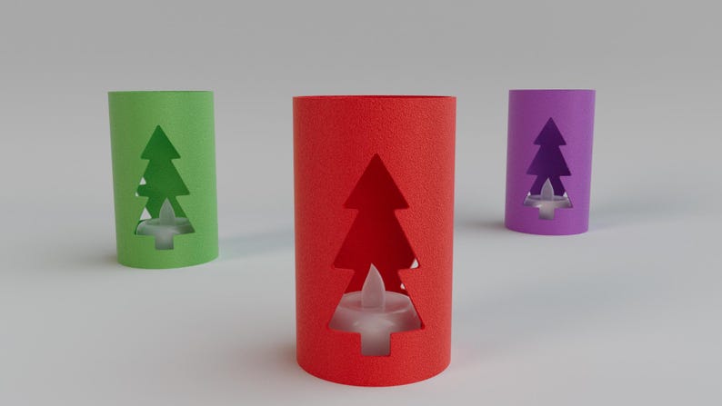 May include: Three cylindrical candle holders in green, red, and purple. Each has a Christmas tree cutout and a small, white, battery-operated candle inside. The candle holders are made of textured paper.