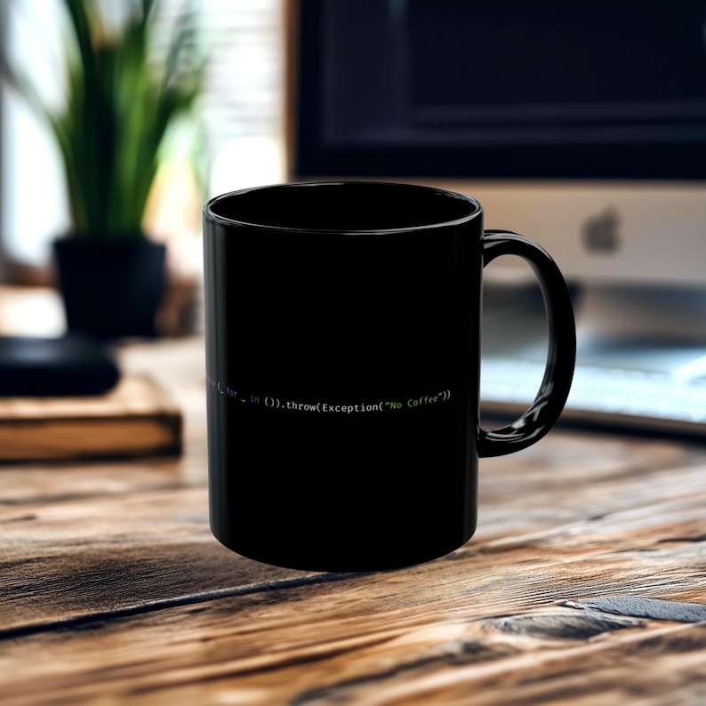 May include: A black coffee mug with a curved handle. The mug features a line of code in a light green font that reads: "...in ().throw(Exception("No Coffee"))". The mug is sitting on a wooden surface.