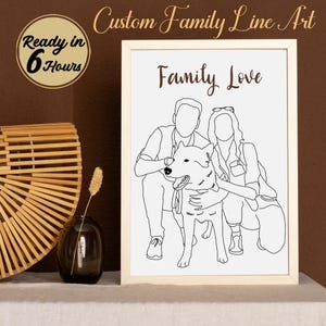 May include: A framed black and white line art print featuring a family with a dog, with the text "Family Love". The print is in a light wood frame. The image also includes the text "Ready in 6 Hours".