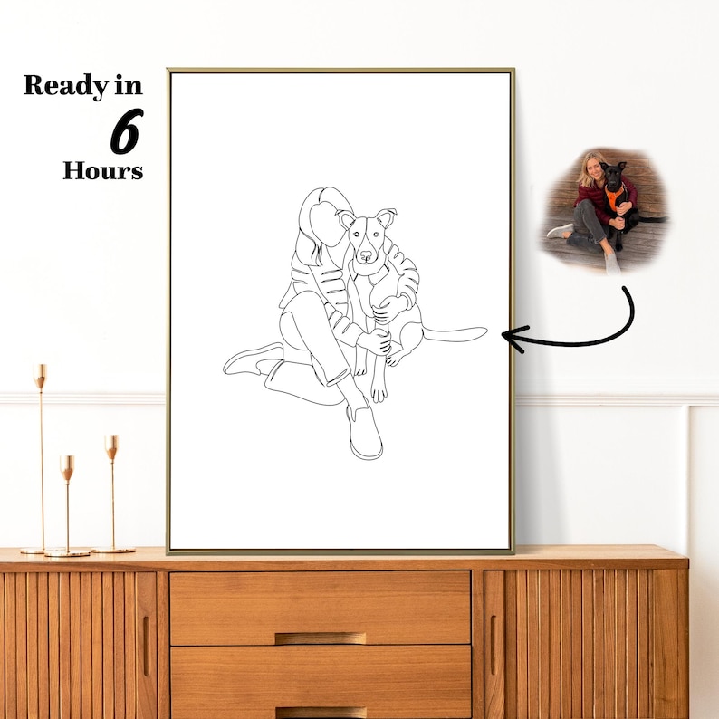 May include: A framed line art print featuring a person seated with a dog. The black and white illustration shows the person embracing the dog. The text "Ready in 6 Hours" is in the upper left corner. A smaller color photo of the dog and person is in the upper right.