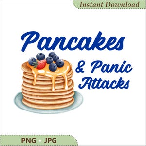 May include: A digital illustration of a stack of golden brown pancakes on a light blue plate, topped with syrup, blueberries, and a strawberry. The text "Pancakes & Panic Attacks" is written in blue script next to the stack on a white background.