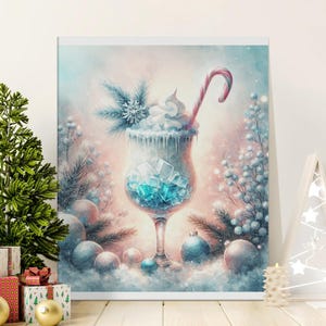 May include: Watercolor print of a festive cocktail with ice cubes, whipped cream, and a candy cane. The artwork has a winter theme with blue and pink hues, surrounded by ornaments and a Christmas tree.