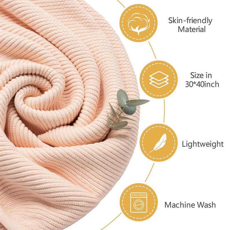 May include: A rolled-up, light peach-colored knitted blanket. The blanket is made of skin-friendly material and is lightweight. The size is 30 x 40 inches. The blanket is machine washable.