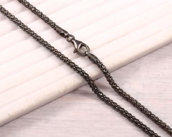 Collana a catena popcorn in argento sterling rodiato nero: design italiano