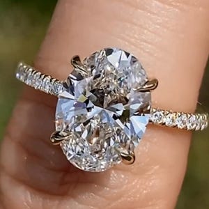 Oval Lab Grown Diamond Engagement Ring: Hidden Halo, Thin Gold Band