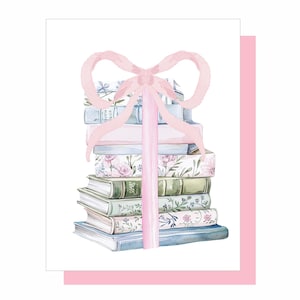 Tarjeta de notas con flores y lazo rosa: un regalo para los amantes de los libros