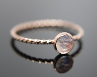 Three 14k rose gold gemstone stacking rings set. Custom band