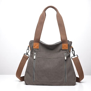 Sac messager en toile unisexe - Sac à bandoulière/sac à bandoulière multipoches pour le voyage et le travail