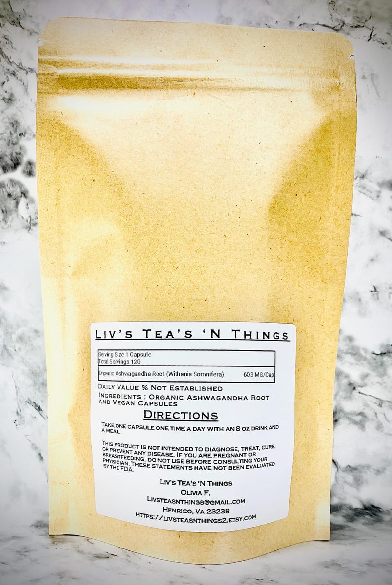 May include: A tan pouch of Liv's Tea's 'N Things capsules. The label states the product contains organic ashwagandha root and vegan capsules. Directions advise taking one capsule daily with an 237 ml drink and a meal.