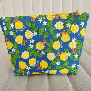 Rilakkuma zipper pouch - Medium shaped cosmetic storage pouch - kawaii Rilakkuma bears on lemons with cute glitter accents pattern