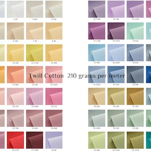 May include: A color chart of 56 fabric swatches, labeled with numbers. The fabric is twill cotton, 210 grams per meter. The swatches range in color from white to dark blue, with many shades of pink, red, orange, yellow, green, and brown.