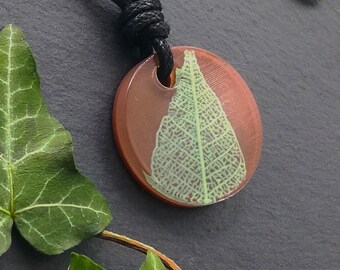 Brown and Green 3D printed circle sculpture pendant, nature inspired leaf skeleton statement necklace