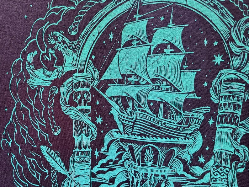 A closeup of the blue pirate ship shows the ship, ropes, and skeletons.