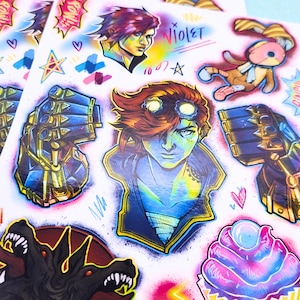 May include: A collection of colorful stickers featuring stylized illustrations. The stickers include portraits of characters with vibrant hair, mechanical gauntlets, a plush toy, and other graphic elements. The word "Violet" is written in purple.