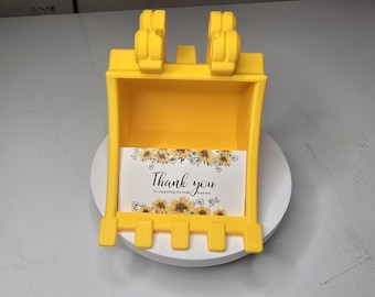 Porta tarjetas de visita con forma de cucharón para excavadora