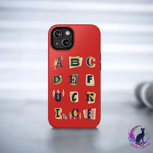 May include: A red phone case featuring a collage of letters in various fonts and styles. The letters spell out words like "DUCK" and "ICE" against a red background. The case has a dual-lens camera.