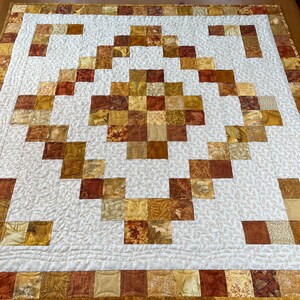 Golden Silhouettes Quilted Table Topper NCU0NNT1800