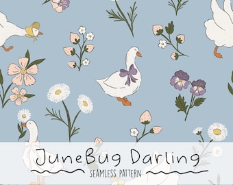 May include: A seamless pattern featuring white geese, daisies, strawberries and purple pansies on a light blue background. The text "JuneBug Darling" is written in a whimsical font at the bottom of the pattern.