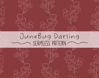 May include: A seamless pattern featuring delicate white floral designs on a deep red background. The text "JuneBug Darling Seamless Pattern" is displayed in black.