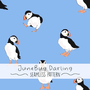 May include: A seamless pattern featuring cartoon puffins in black, white, and orange against a light blue background. The text "JuneBug Darling SEAMLESS PATTERN" is included in the design.
