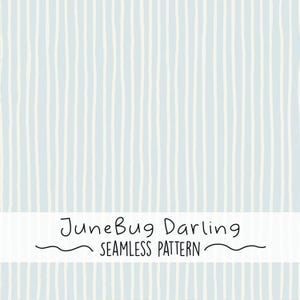 May include: A seamless pattern featuring vertical, uneven, off-white stripes on a light blue background. The text "JuneBug Darling SEAMLESS PATTERN" is displayed in a white rectangular banner at the bottom of the image.