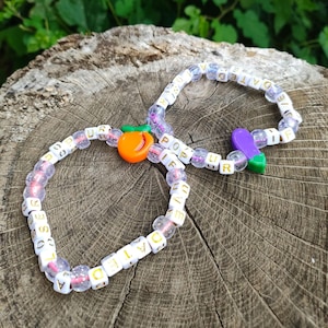 pop ur if uve dated a loser, eggplant or peach Kandi bracelet