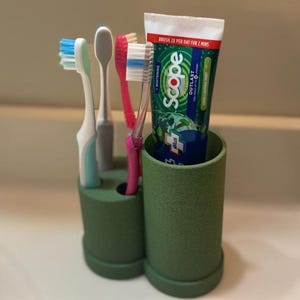 Toothbrush and toothpaste holder