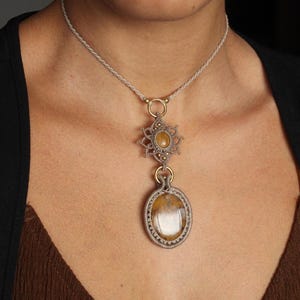 Handmade macrame necklace with hungarian agate and tiger eye stones brass accents.  Boho earthy jewelry adjustable and an unique piece.