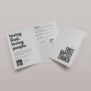 May include: A white brochure with black text. The open brochure reads "loving God. loving people." and includes a photo and text. The closed brochure displays "First Baptist Church" in a circular design.