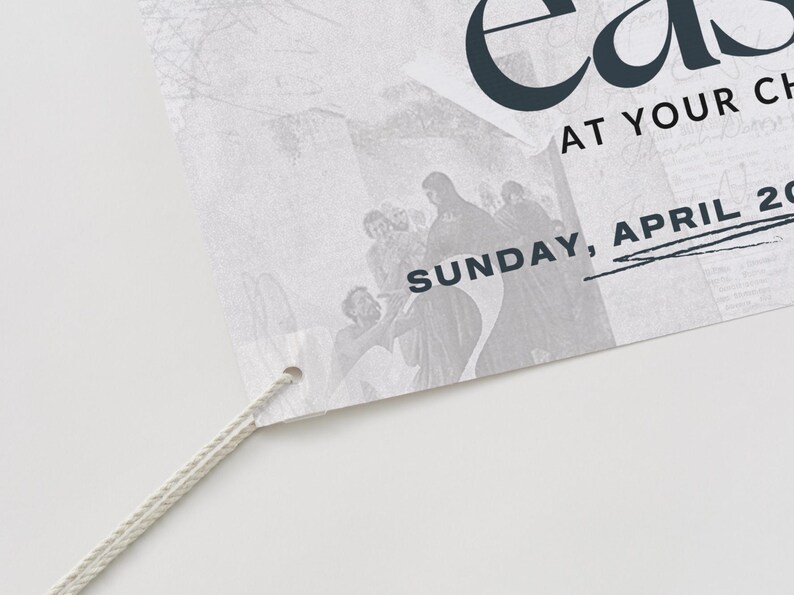May include: A white poster with the word "Easter" in black text. The poster also includes the text "At Your Church" and "Sunday, April 20". The poster has a white string attached to it.