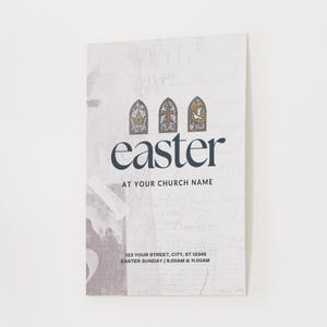May include: A white poster with a textured background featuring three stained glass windows with a dove, a cross, and a crown. The text "easter" is in black text with the words "AT YOUR CHURCH NAME" below. The poster also includes the address "123 YOUR STREET, CITY, ST 12345" and the times "EASTER SUNDAY 9.00AM & 11.00AM".
